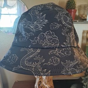 Navy bucket hat with dragon designs